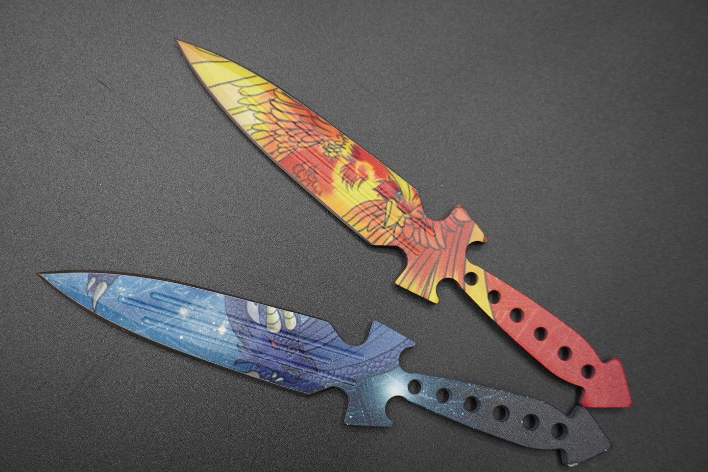 Decorative Knives with Artistic Handles on a Dark Background