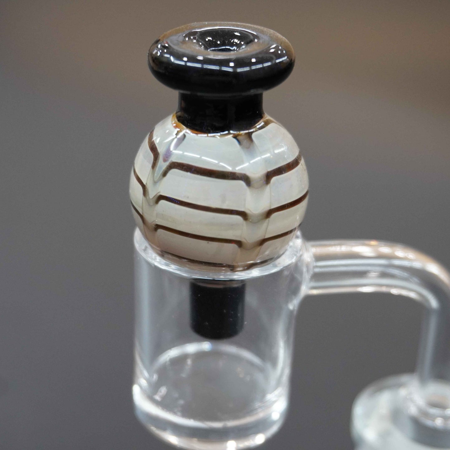 Raked bubble carb cap