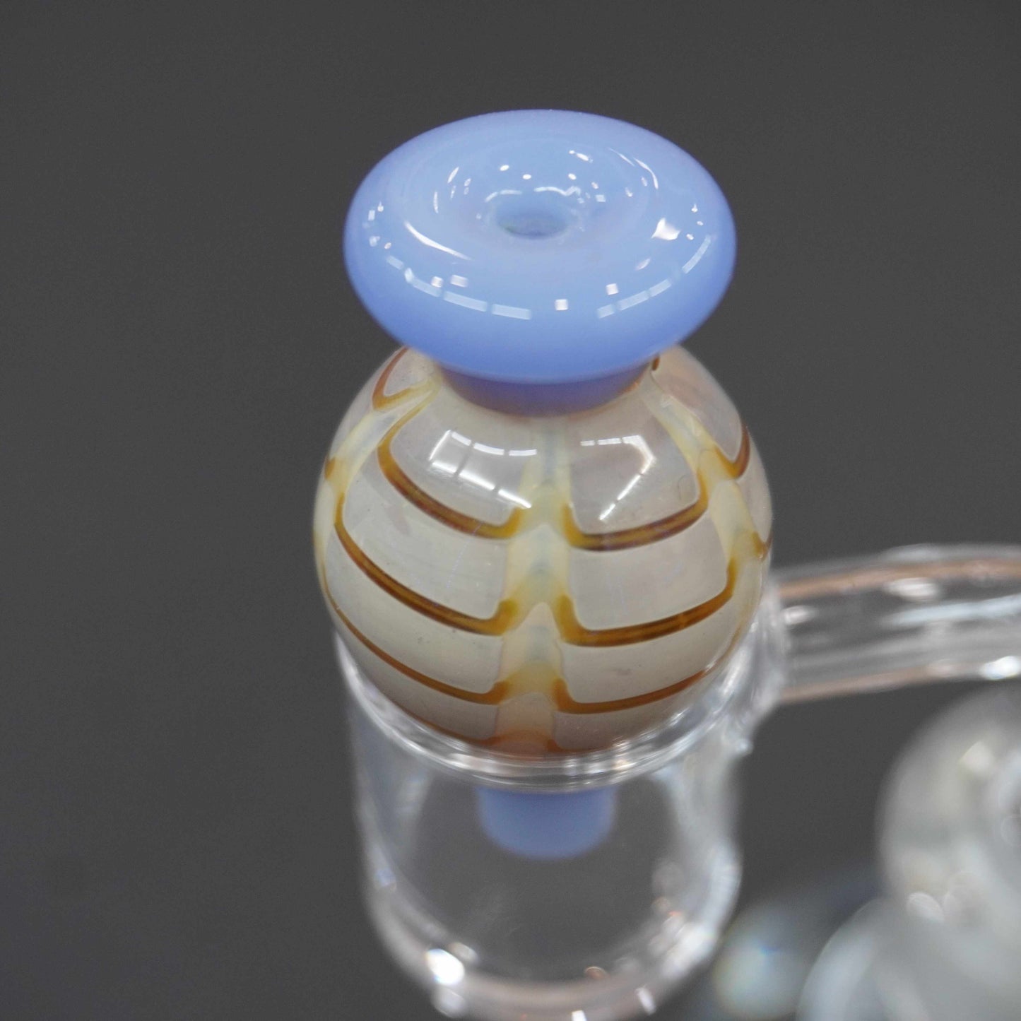 Raked bubble carb cap