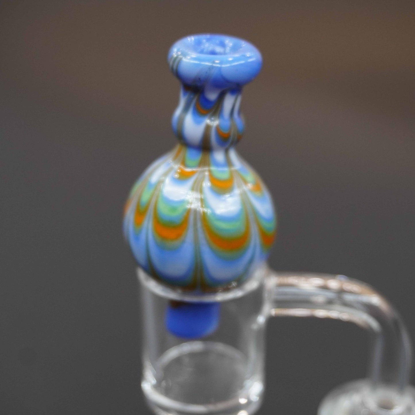 Raked bubble carb cap