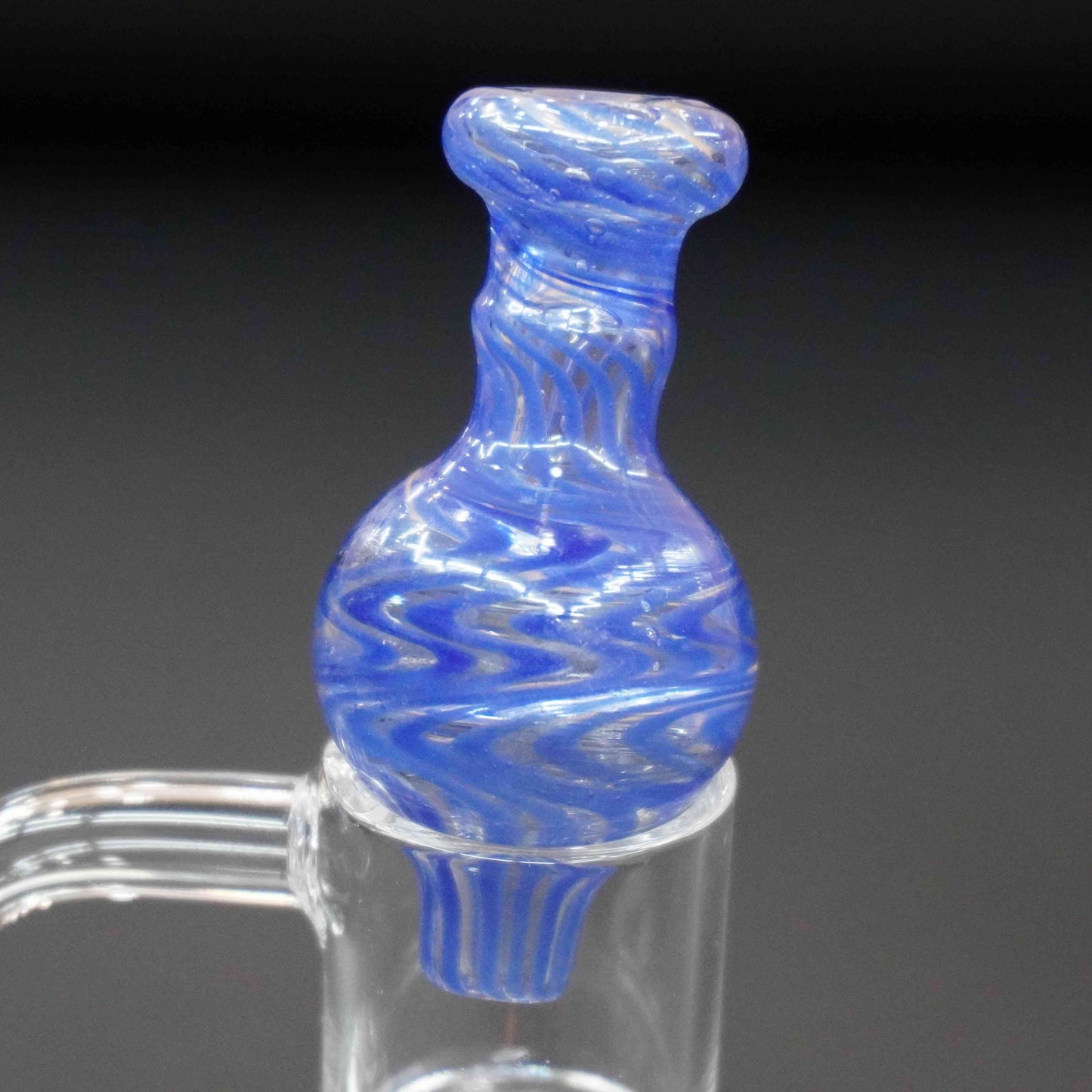 Swirl bubble carb cap