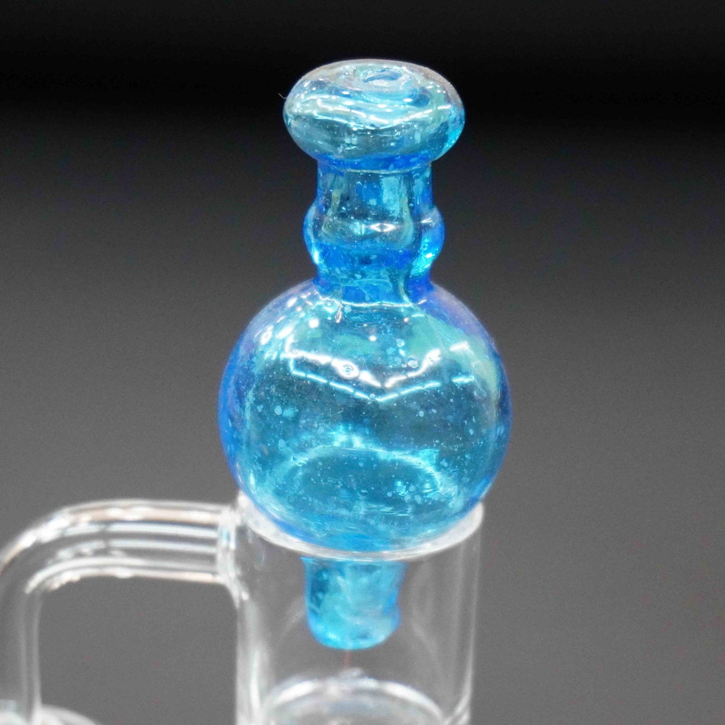 Bubble carb cap