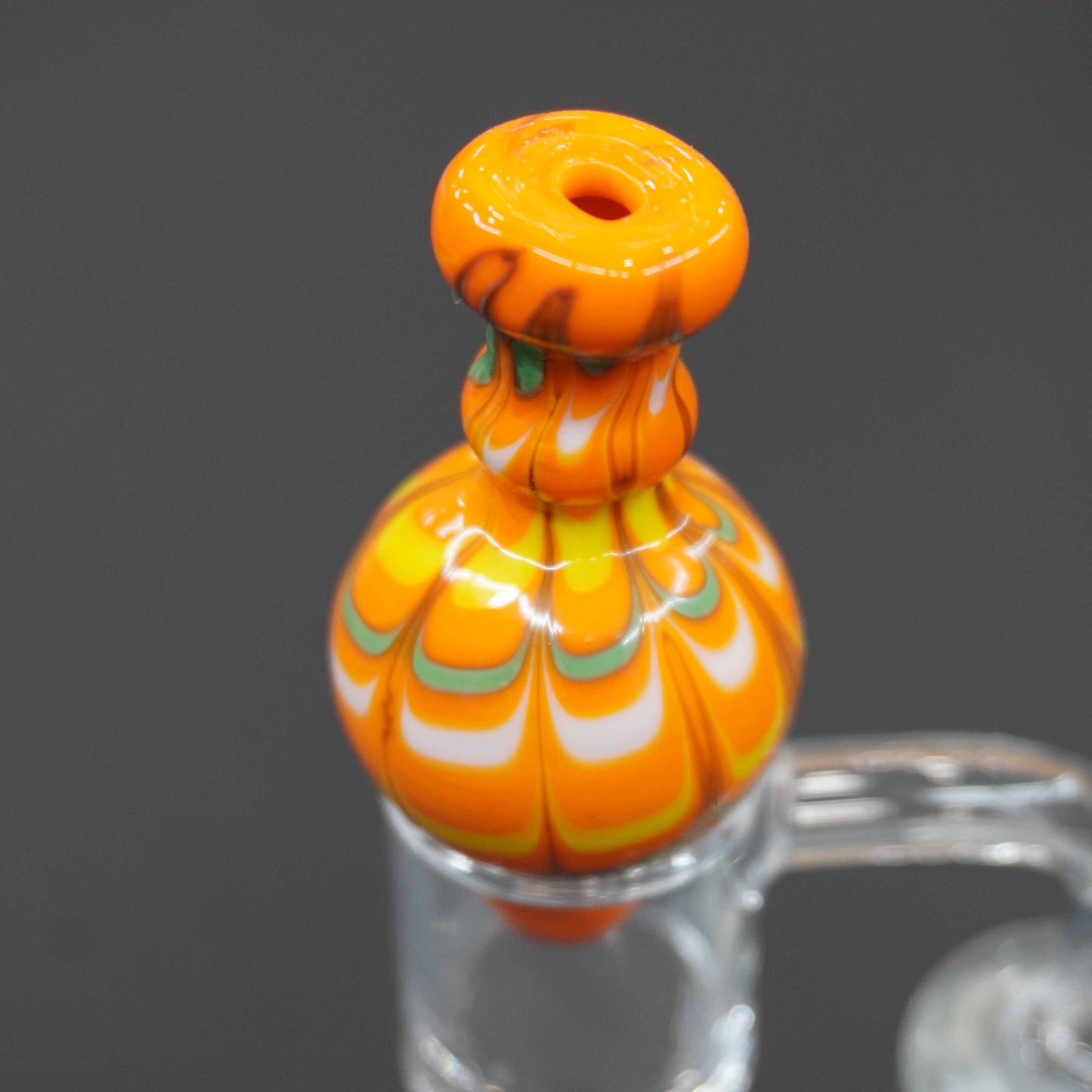 Raked bubble carb cap