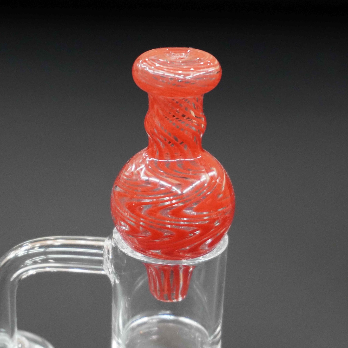 Swirl bubble carb cap