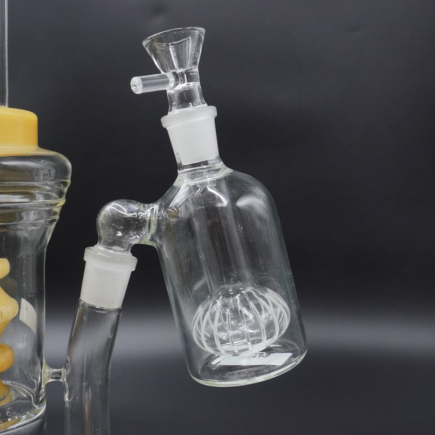 The "Dual-Action" 45° Ash Catcher Series (Showerhead or Coil)