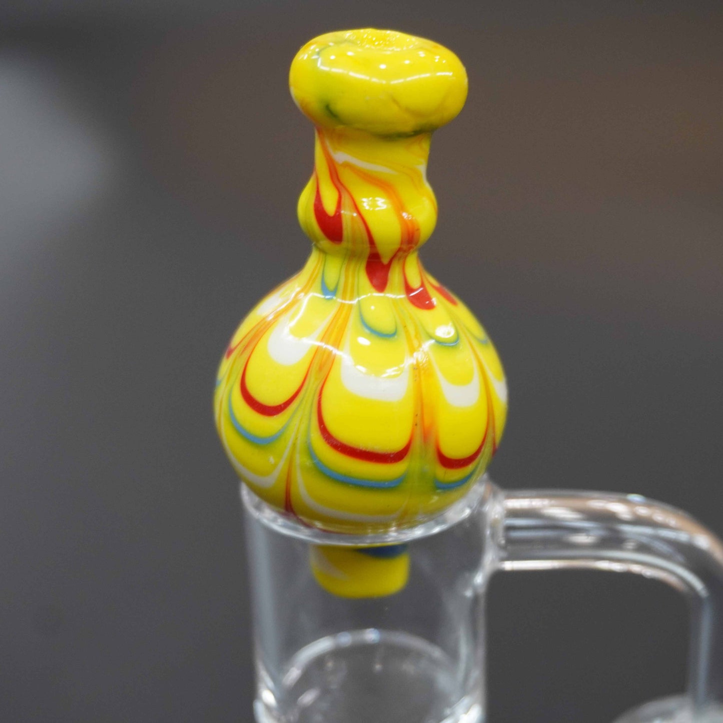 Raked bubble carb cap