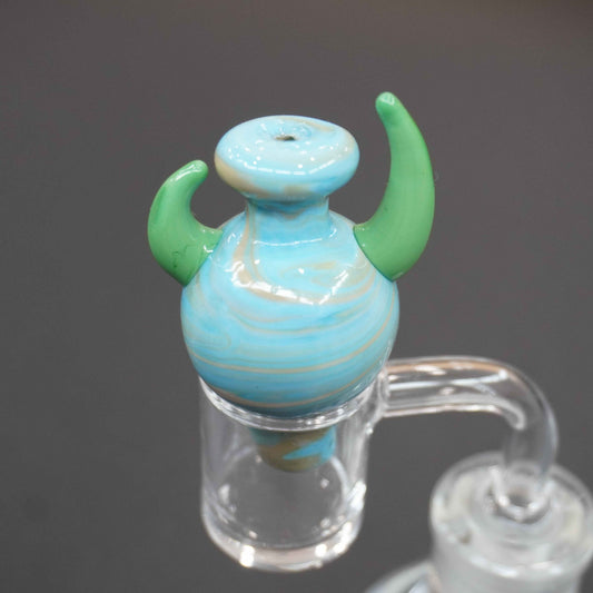 Horned carb cap