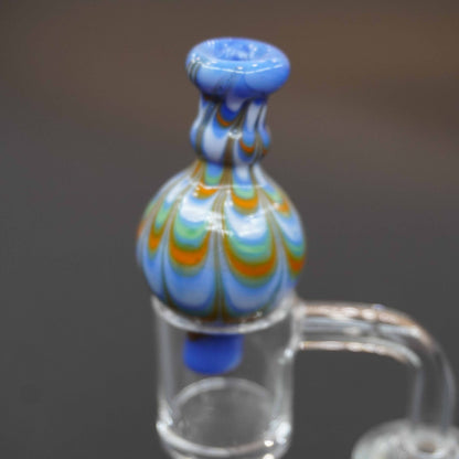 Raked bubble carb cap