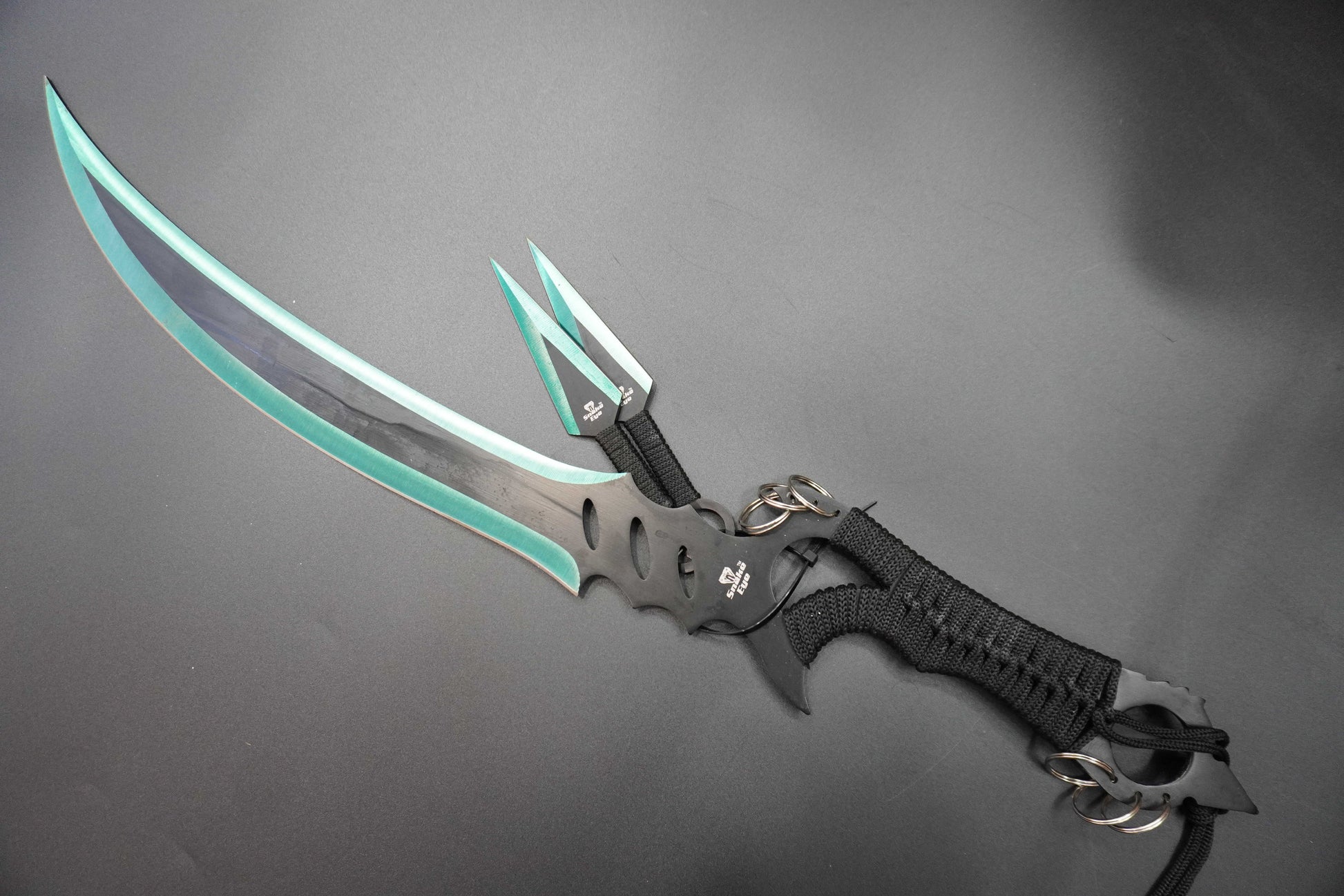 Futuristic knife with glowing blade on a gray background