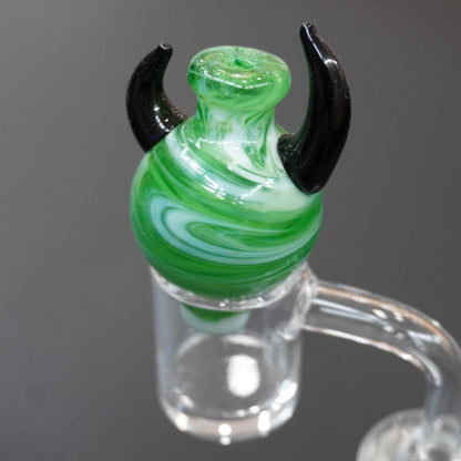 Horned carb cap