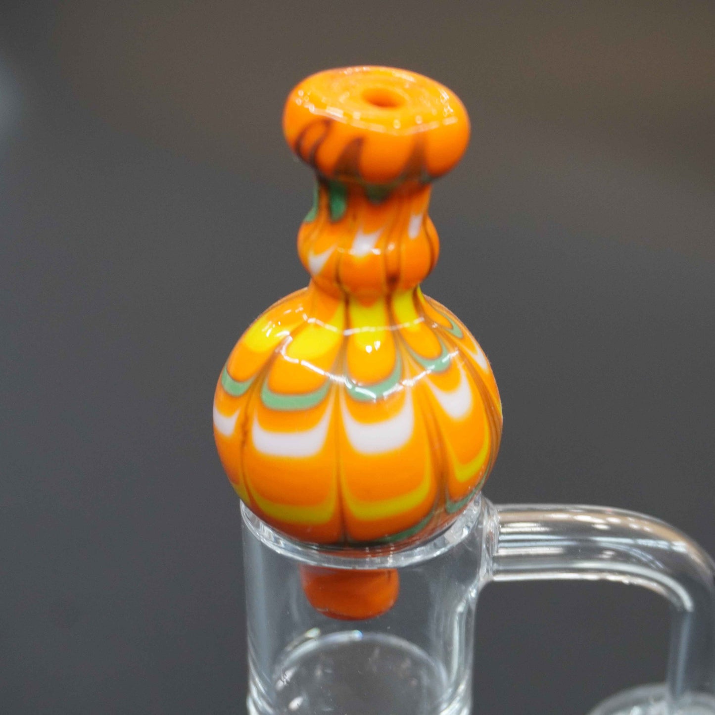 Raked bubble carb cap