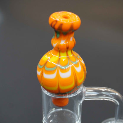 Raked bubble carb cap