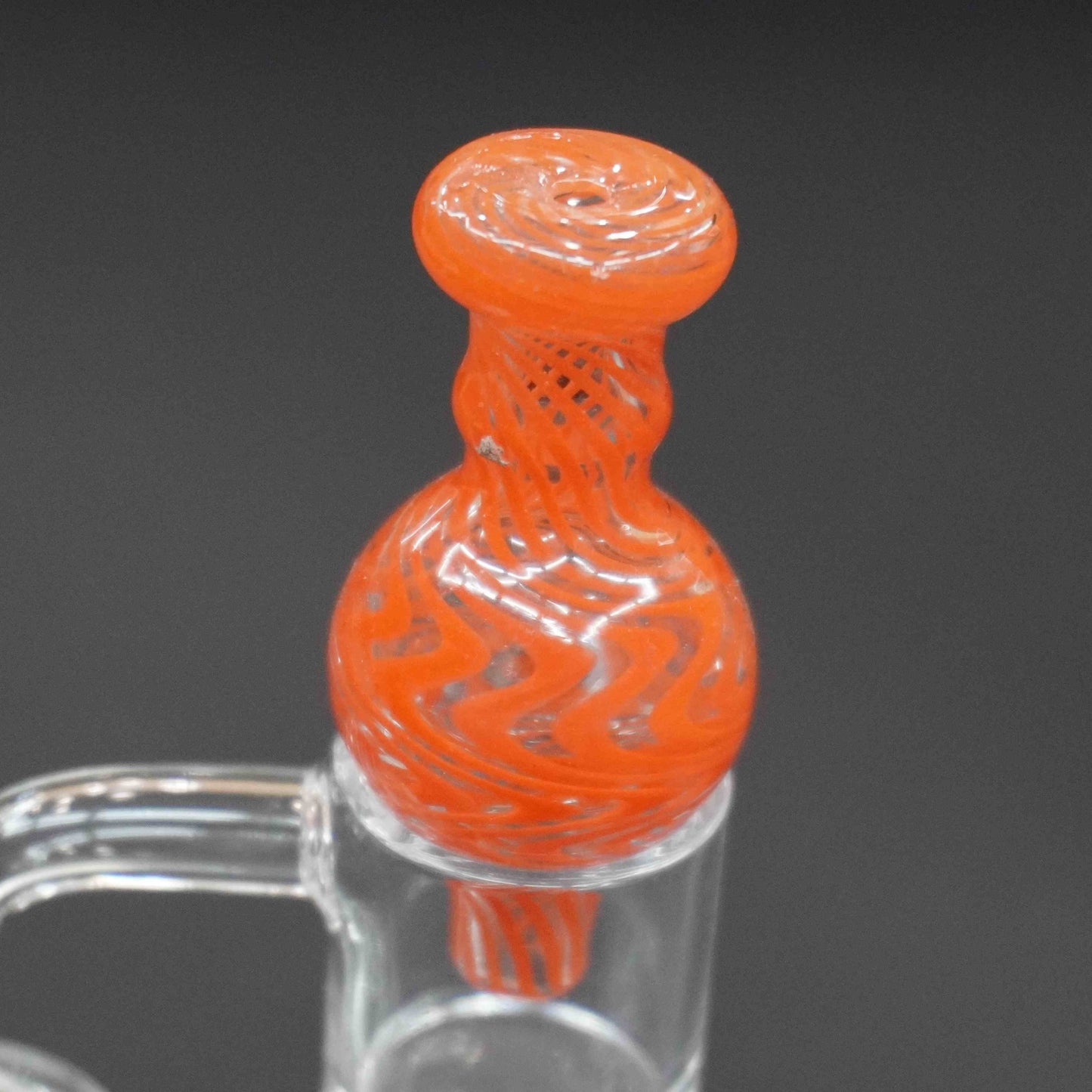 Swirl bubble carb cap