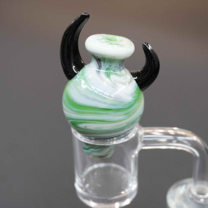 Horned carb cap