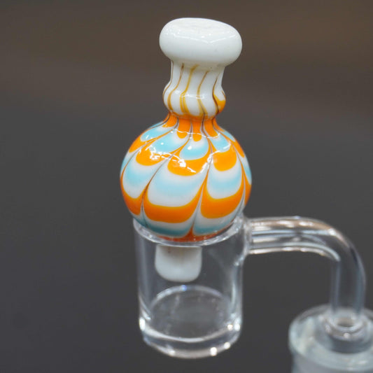 Raked bubble carb cap
