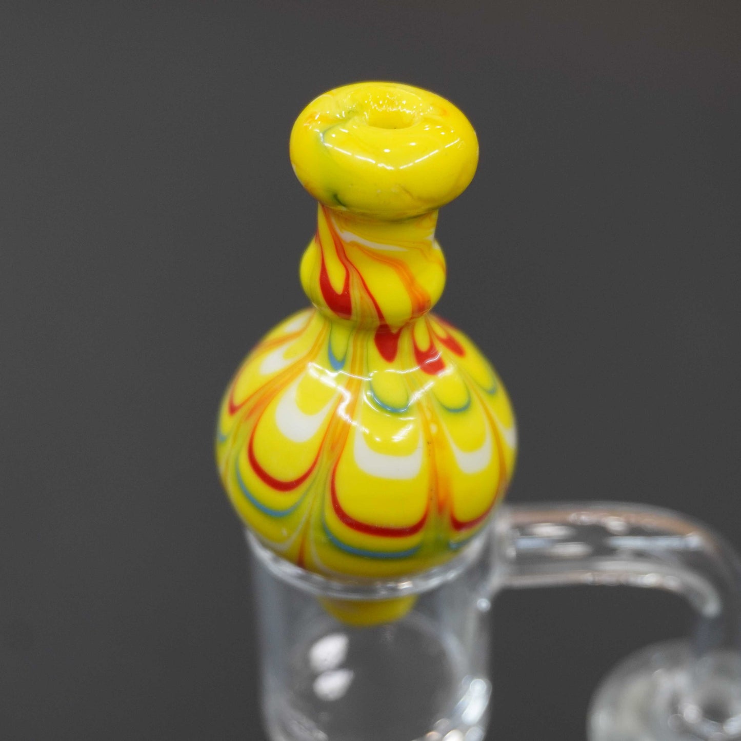 Raked bubble carb cap